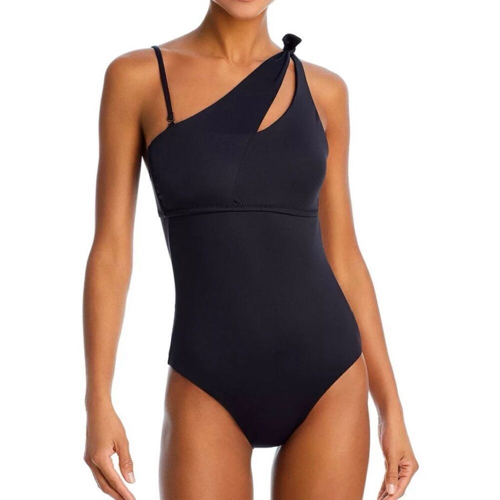 New BECCA by Rebecca Virtue black one shoulder asymmetrical cut out swimsuit. Si